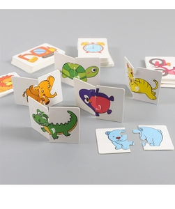 Gros plan de puzzles d'animaux en deux pièces pour enfants avec des pièces en carton épais