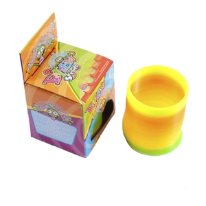 Rainbow spring toy with gradient colors and colorful packaging box on white background