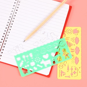 Creative drawing stencil set for kids with pencil on notebook in 45-degree angle