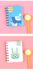 Detail of A7 mini spiral notebooks featuring cute elephant and rabbit designs with yellow pens
