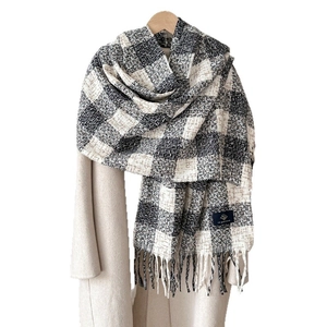 Classic black and white checkered tassel scarf in soft cashmere style for winter warmth