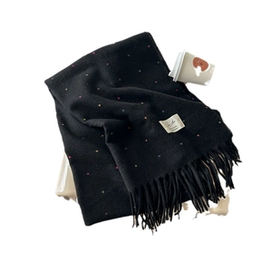 Soft black knit scarf with colorful polka dots and tassel edges for winter fashion