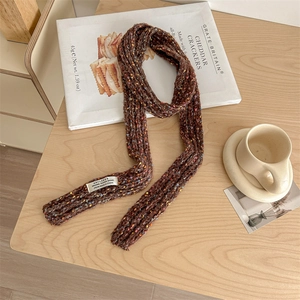 Coffee brown confetti yarn knit scarf with colorful specks and a minimal woven label