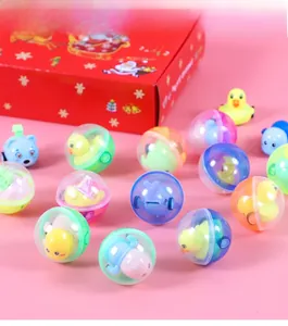 Jouets capsules colorés avec figurines d'animaux et coffret cadeau de Noël festif