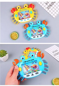 Detail of handheld water ring game in crab shape with colorful buttons and water chamber