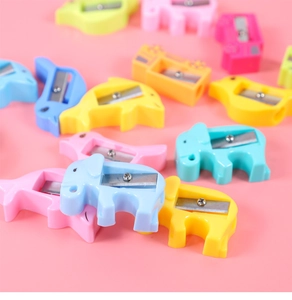 Close-up of colorful cartoon animal pencil sharpeners in various pastel colors and shapes