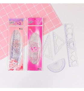 Detailed view of 4-piece clear plastic drawing set with rulers and protractor