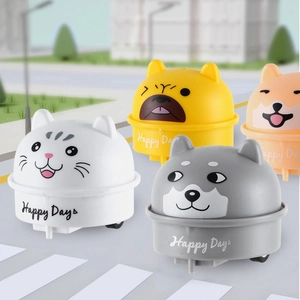 Pull-back animal toy cars featuring cat and dog designs on a cartoon street set