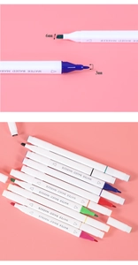 Detailed close-up of dual-tip water-based markers with 6mm and 3mm tips on pink background