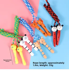 Detail of wooden cartoon animal handles and colorful braided jump ropes for children