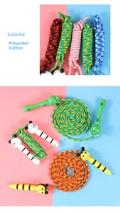 Close-up of durable woven cotton jump rope with smooth painted wooden cartoon handles