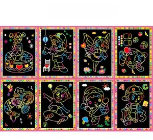 Detail view of 8 rainbow scratch art cards with fairy and mermaid patterns for kids