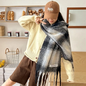 Classic checkered mohair scarf with tassels in black and blue for warm winter style