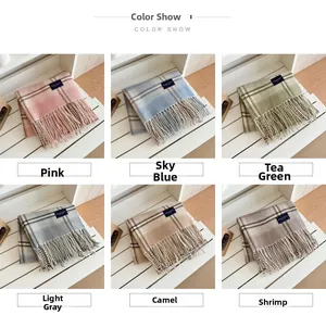 Detail showing six colors of check tassels scarves with thick cashmere texture