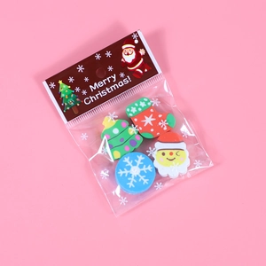 Christmas themed rubber eraser set with Santa Claus and tree in transparent packaging