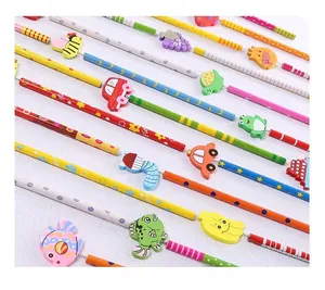Detail showing colorful HB pencils with cute 3D cartoon fruit and animal erasers