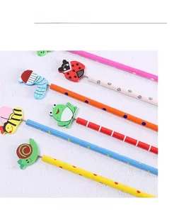 Detail of colorful HB wooden pencils with spring-mounted wooden cartoon insects on top
