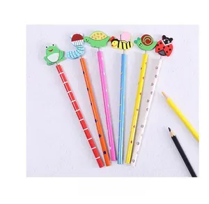 Detail of wooden HB pencils with spring-mounted cartoon animals and colorful patterns