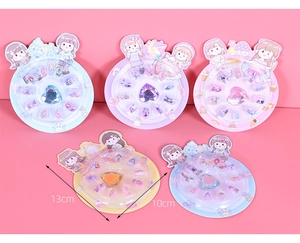 Detail showing 13x10cm packaging for cartoon girl jewelry rings and nail art kits