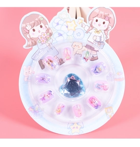 Detailed view of 10-piece cartoon press-on nail set for girls in a round display box