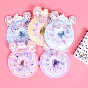 Cute cartoon girl nail art set for kids with colorful gemstones and dessert patterns