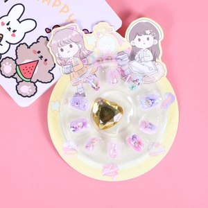 Pink cartoon girls press-on nail set for kids with large yellow heart gemstone