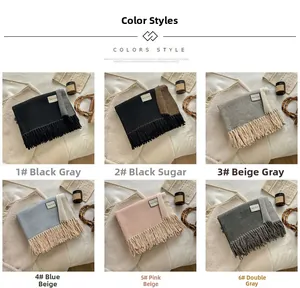 Detailed view of six wool blend scarf color options with fringe and brand labels