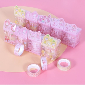 Detail of cartoon washi tape set featuring strawberry and bear patterns in gift box