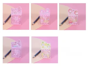 Detailed view of 5 sets of colorful cartoon decorative tapes in clear plastic packaging