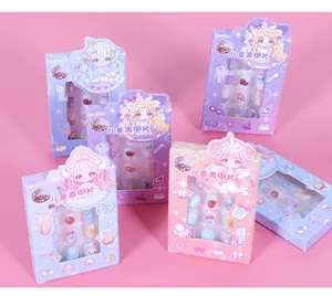 Detail of assorted cartoon press-on nail sets for children with cute girl IP characters