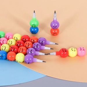 Close-up of colorful stacking pencils featuring fun expressive emoji faces for kids