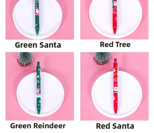 Detail shot of Christmas click gel pens featuring Santa and reindeer festive designs