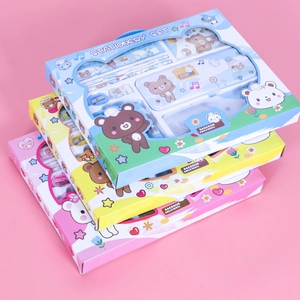 Close-up of children's stationery gift sets with pencil cases and multiplication tables