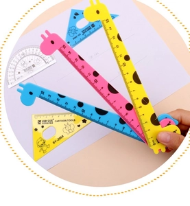 Detailed close-up of a 15cm giraffe shaped plastic ruler set for students with scale markings
