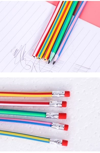 Macro detail of flexible rainbow striped pencils with eraser tips and writing samples