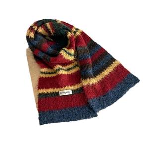 Knitted wool scarf with multicolor stripes in deep red, navy and green tones