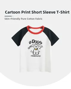Detail of kids raglan t-shirt showing soft cotton fabric and cute cartoon dog print