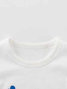 White cotton t-shirt for boys featuring a classic round neck and blue cartoon print