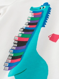 White cotton t-shirt for boys featuring a creative dinosaur and colorful book print