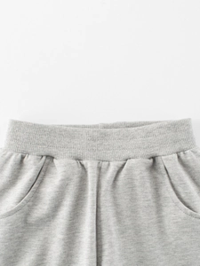 Kids grey heather jersey cotton shorts with elastic ribbed waistband and side pockets