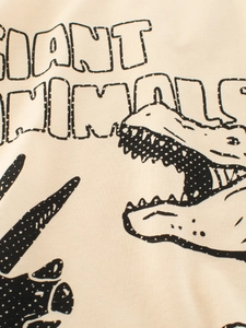 Beige cotton t-shirt for boys with black dinosaur print and Giant Animals text design