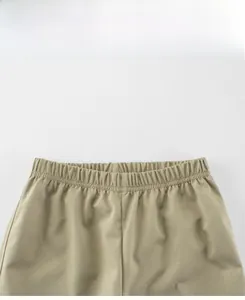 Detail of kids quick-dry casual pants showing elastic waistband and soft fabric texture