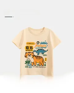 Close-up of cream-colored kids' cotton t-shirt with tiger and dinosaur cartoon print
