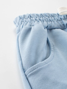 Light blue mesh breathable boys' sports shorts with elastic waist and drawstring