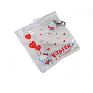 Cartoon bear transparent PVC zipper pouch containing white cake-shaped erasers