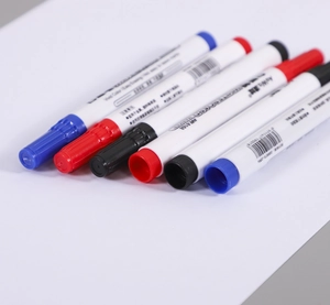 Close-up of a 6-piece whiteboard marker set in red, blue, and black with caps off