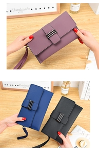 Détails de portefeuilles longs en cuir grainé avec boucles métalliques et dragonnes assorties