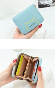 Detail view of mini cat coin purse with multi-layer card slots and zipper pocket