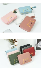Detailed close-up of colorful PU leather mini cat coin purses with tassel and star pendant