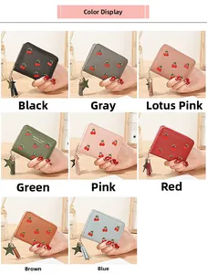 Short zipper wallets with cherry embroidery shown in multiple colors and tassel charms